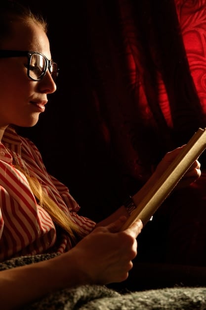 A close-up of a film critic writing notes in a dark movie theater, the glow of the screen reflected in their glasses, showcasing their dedication to analyzing the film.
