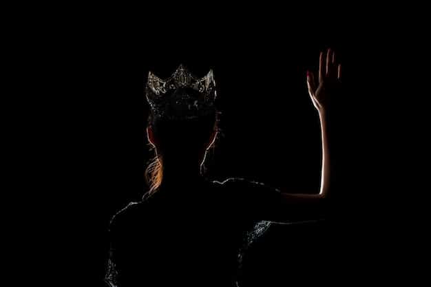A dramatic shot of Catwoman (Selina Kyle) perched on a rooftop, silhouetted against the Gotham City skyline. She is wearing her catsuit and goggles, exuding confidence and mystery.