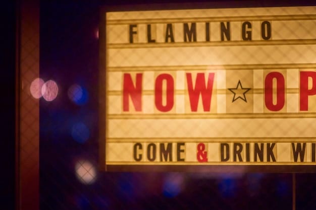 A vintage movie theater marquee displaying the title of a classic film, with patrons lined up to enter, capturing the nostalgic charm and community spirit of early cinema.