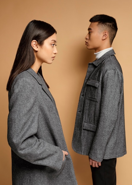 Lee Min-ho and Kim Go-eun standing awkwardly beside each other in regal settings, with a visible lack of warmth or connection in their expressions.