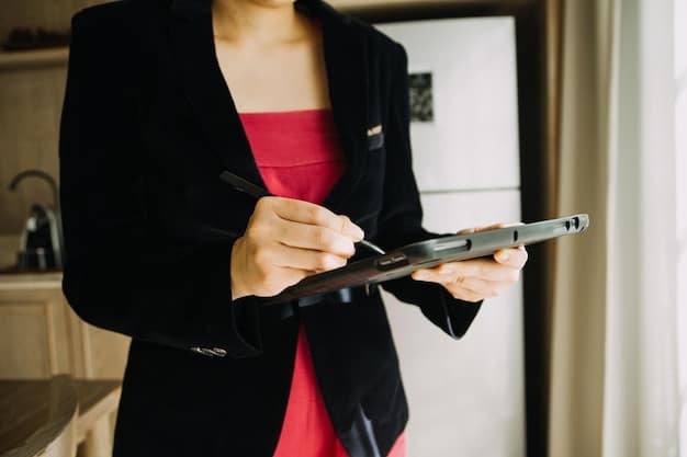 A person making notes on a notepad, preparing to contact customer support with organized information.